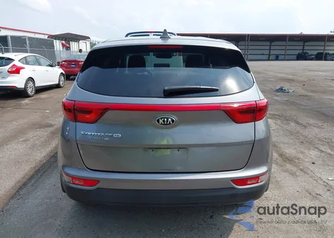 2019 Kia Sportage Lx z USA, uszkodzony, nr VIN KNDPM3AC7K7560377
